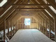 1304 Trisail Terrace, Wilmington, NC 28412 — 3-bedroom waterfront home in Riverlights, Wilmington, NC, photo 15 of 52: Attic