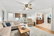 211 Vine Street, Beaufort, NC 28516 — 3-bedroom home in Jones Village, Beaufort, NC, photo 22 of 36: Living Room To Kitchen