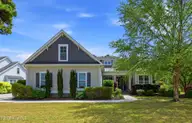 9385 Fallen Pear Lane NE, Leland, NC 28451 — 4-bedroom waterfront home in The Bluffs on the Cape Fear, Leland, NC, photo 2 of 68: 9385_Fallen_Pear_Ln_NE_001