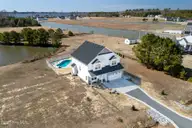 456 Pointe Vista Drive, Elizabeth City, NC 27909 — 4-bedroom waterfront home in The Waters At Sunset Pointe, Elizabeth City, NC, photo 3 of 49: 49-456 Pointe Vista - Drone-4