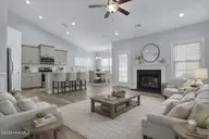 95 Collins Way, Hampstead, NC 28443 — 4-bedroom home in Villages at Olde Point, Hampstead, NC, photo 8 of 37: GARGAN AI PHOTO LIVING ROOM