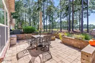 125 W Chelsea Court, Southern Pines, NC 28387 — 3-bedroom condo in Mid South Club, Southern Pines, NC, photo 3 of 45: Patio