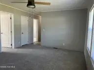 316 Commodore Drive, Rocky Mount, NC 27801 — 3-bedroom manufactured home in Eastfield, Rocky Mount, NC, photo 14 of 32: Master Bedroom view 2