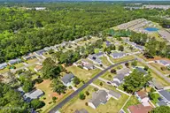 836 Nicholas Drive SW, Calabash, NC 28467 — 3-bedroom manufactured home in Village At Calabash, Calabash, NC, photo 4 of 61: 53_dji_0744