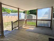 1984 River Street SW, Supply, NC 28462 — 3-bedroom manufactured home in Fishermans Village, Supply, NC, photo 19 of 37: deck2