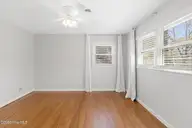 3208 Country Club Road, Morehead City, NC 28557 — 4-bedroom home in Miller Harrell, Morehead City, NC, photo 24 of 49: Primary Bedroom