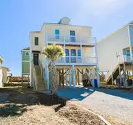 2802 Island Drive, North Topsail Beach, NC 28460 — 4-bedroom waterfront home in Ocean City, North Topsail Beach, NC, photo 1 of 37: 2802 Island Crop 826