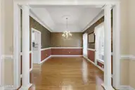 209 Small Drive, Elizabeth City, NC 27909 — 3-bedroom waterfront home in Newbegun Land, Elizabeth City, NC, photo 4 of 39: 209 Small view of DR from foyer