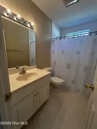 4111 Yarmouth Road, New Bern, NC 28562 — 3-bedroom home in Kings Row, New Bern, NC, photo 19 of 25: GUEST BATH