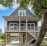 681 Forest Drive SE, Bolivia, NC 28422 — 2-bedroom waterfront home in Sunset Harbor, Bolivia, NC, photo 1 of 32: frontLaura