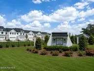 304 Colmar Way E, Greenville, NC 27858 — 3-bedroom townhome in The Enclave, Greenville, NC, photo 7 of 13: sign