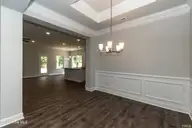 123 White Bark Avenue Lot 18, Rocky Mount, NC 27804 — 3-bedroom home in Longneedle, Rocky Mount, NC, photo 14 of 24: Formal Dining Room With Shadow Boxes 152