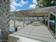 465 Lockwood Lane SW, Supply, NC 28462 — 3-bedroom waterfront home in Lockwood Folly, Supply, NC, photo 24 of 32: Pool