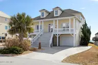 9711 Dolphin Ridge Road, Emerald Isle, NC 28594 — 4-bedroom waterfront home in Dolphin Ridge, Emerald Isle, NC, photo 1 of 37: Once Upon a Time front