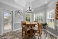 117 Oak Summit Drive, Pikeville, NC 27863 — 3-bedroom home in Oak Summit, Pikeville, NC, photo 15 of 59: 117 Oak Summit Dr Dining Area