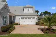141 Clubhouse Road, Sunset Beach, NC 28468 — 4-bedroom home in Sea Trail Plantation, Sunset Beach, NC, photo 4 of 59: Side Garage