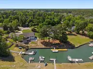 304 Gull Road, Hampstead, NC 28443 — 3-bedroom waterfront home in Olde Point, Hampstead, NC, photo 7 of 50: 51-DJI_20260420143544_0241_D-Edit