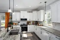 541 Moss Lake Lane, Holly Ridge, NC 28445 — 4-bedroom home in Summerhouse On Everett Bay, Holly Ridge, NC, photo 14 of 71: kitchen-01c