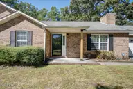 105 Cherry Branch Drive, Havelock, NC 28532 — 3-bedroom waterfront home in Cherry Branch, Havelock, NC, photo 2 of 43: Front
