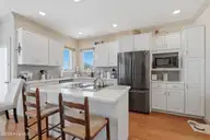 5 Osprey Circle, North Topsail Beach, NC 28460 — 3-bedroom waterfront home in Crystal Shores, North Topsail Beach, NC, photo 20 of 79: 24_kitchen