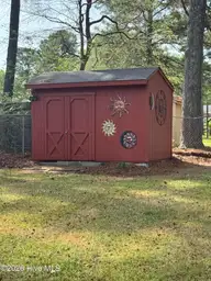 1311 Briarwood Drive NW, Wilson, NC 27896 — 3-bedroom home in Edgewood, Wilson, NC, photo 8 of 25: Backyard Storage Building