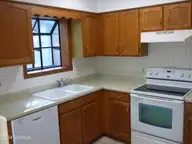 4194 Spirea Drive Unit B, Wilmington, NC 28403 — 2-bedroom condo in Franklin Square, Wilmington, NC, photo 7 of 10: Kitchen
