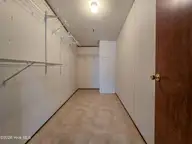 107 Bluebird Drive, Elizabeth City, NC 27909 — 3-bedroom manufactured home in Halls Creek Village, Elizabeth City, NC, photo 10 of 21: Primary Closet
