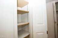 250 Sugar Gum Lane 124, Pinehurst, NC 28374 — 3-bedroom condo in Lakeview Condos, Pinehurst, NC, photo 24 of 55: Kitchen Pantry