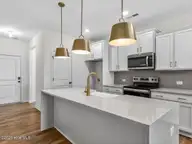 38 N District Avenue, Clayton, NC 27527 — 3-bedroom home in Flowers Plantation, Clayton, NC, photo 7 of 38: 008-1280x960-kitchen