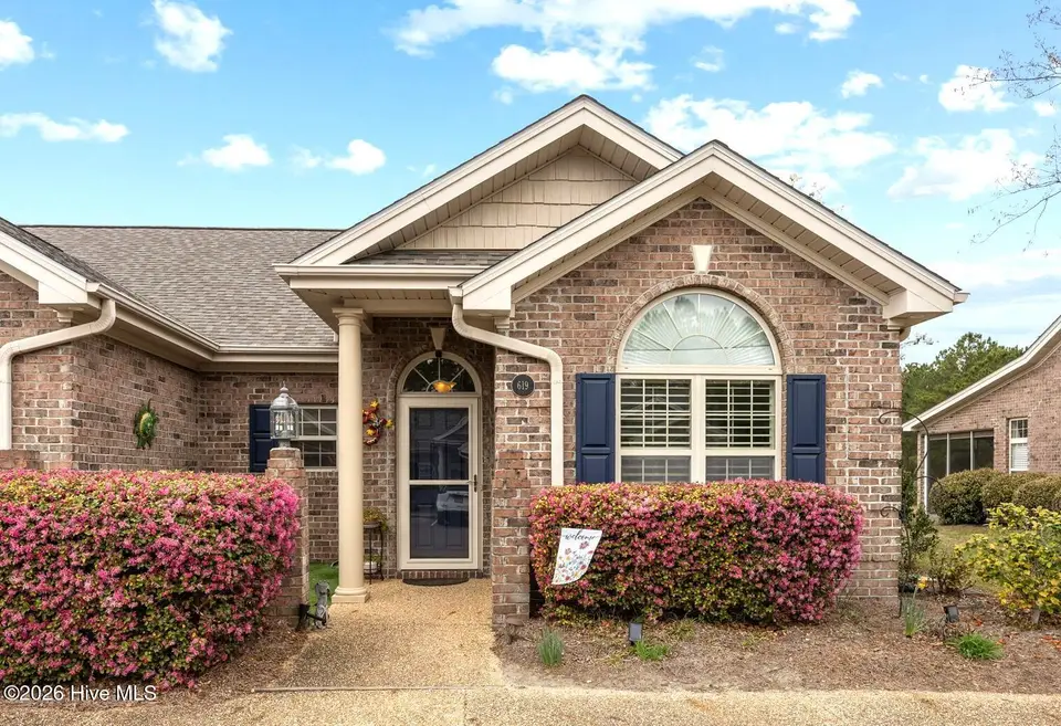 619 Elfin Court, Leland, NC 28479 — 2-bedroom waterfront townhome in Westport, Leland, NC, photo 1 of 38: Front View 619 Elfin