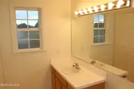 317 Foxhall Road, Newport, NC 28570 — 3-bedroom home in Sand Ridge, Newport, NC, photo 13 of 26: Master Bath View 1