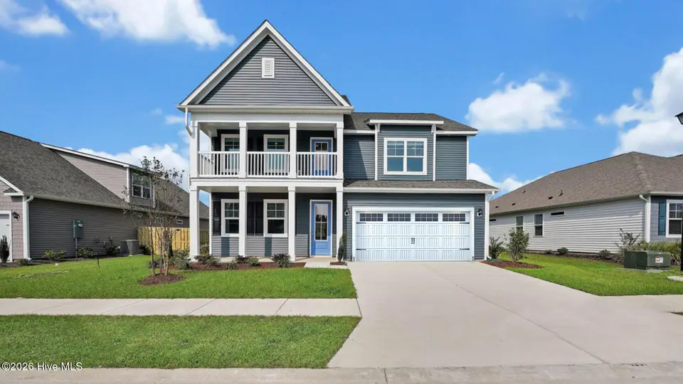 3221 Butterfly Ginger Street Lot 74, Leland, NC 28451 — 4-bedroom waterfront home in Indigo Preserve, Leland, NC, photo 1 of 60