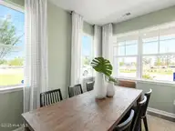 4254 Allsbrook Lane Unit 1013, Leland, NC 28451 — 3-bedroom townhome in Indigo Preserve, Leland, NC, photo 4 of 39: Dining/Flex Room off the foyer