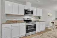 5260 Soy Bean Drive NE, Winnabow, NC 28479 — 4-bedroom home in Country Walk, Winnabow, NC, photo 8 of 24: Kitchen