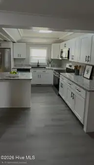 305 E Oak Street, Lake Waccamaw, NC 28450 — 3-bedroom home, Lake Waccamaw, NC, photo 9 of 44: AI Generated