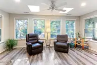 385 Pinehurst Trace Drive, Pinehurst, NC 28374 — 2-bedroom home in Pinehurst Trace, Pinehurst, NC, photo 8 of 39: Carolina Room