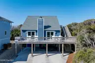1707 S Shore Drive, Surf City, NC 28445 — 3-bedroom waterfront home in White Hills Beach, Surf City, NC, photo 4 of 65: aerials-low-pass-09