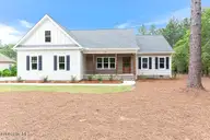 131 Longleaf Drive, West End, NC 27376 — 4-bedroom home in Seven Lakes West, West End, NC, photo 1 of 39: front