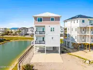13 Via Dolorosa Drive, Ocean Isle Beach, NC 28469 — 6-bedroom waterfront home in Islander Resort, Ocean Isle Beach, NC, photo 6 of 74: 6-web-or-mls-CAMMediaLLC.com-107
