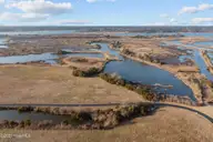 27 Hunter Heath Drive, North Topsail Beach, NC 28460 — waterfront lot in Ashe Island Farm, North Topsail Beach, NC, photo 9 of 21: Aerial View