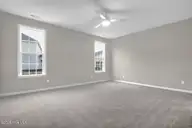 3319 Grand Park Way, Leland, NC 28451 — 5-bedroom home in Grand Park, Leland, NC, photo 19 of 47: Primary Bedroom