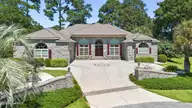 205 Jones Byrd Court, Sunset Beach, NC 28468 — 4-bedroom home in Sea Trail Plantation, Sunset Beach, NC, photo 1 of 71: mls-DJI_0660
