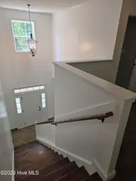 39 Forest Lake Drive, Jackson Springs, NC 27281 — 4-bedroom home in Foxfire Village East, Jackson Springs, NC, photo 24 of 49: 24 Staircase to 2-story Entry