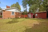 704 N Grace Avenue, New Bern, NC 28562 — 3-bedroom home in Trent Park, New Bern, NC, photo 8 of 46: Side of the house