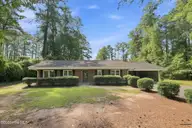 117 Lakeview Drive, Whispering Pines, NC 28327 — 3-bedroom waterfront home in Whispering Pines, Whispering Pines, NC, photo 1 of 55: Front Elevation