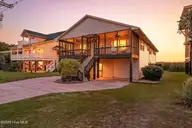 1135 S Topsail Drive, Surf City, NC 28445 — 4-bedroom waterfront home in Horse Hammock, Surf City, NC, photo 1 of 68: image_0