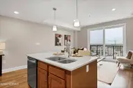 14 Grace Street 920, Wilmington, NC 28401 — 1-bedroom condo in River Place, Wilmington, NC, photo 7 of 26: Kitchen Island