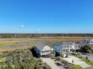 1020 W Pelican Drive, Oak Island, NC 28465 — 3-bedroom waterfront home in W. Long Beach, Oak Island, NC, photo 3 of 47: 1020 W Pelican