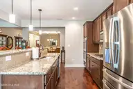 255 Champions Ridge Drive, Southern Pines, NC 28387 — 3-bedroom home in Mid South Club, Southern Pines, NC, photo 11 of 56: Kitchen
