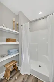 9579 Lily Pond Court NE, Leland, NC 28451 — 3-bedroom home in Lily Pond, Leland, NC, photo 20 of 33: Walk-in shower, built-in shelves